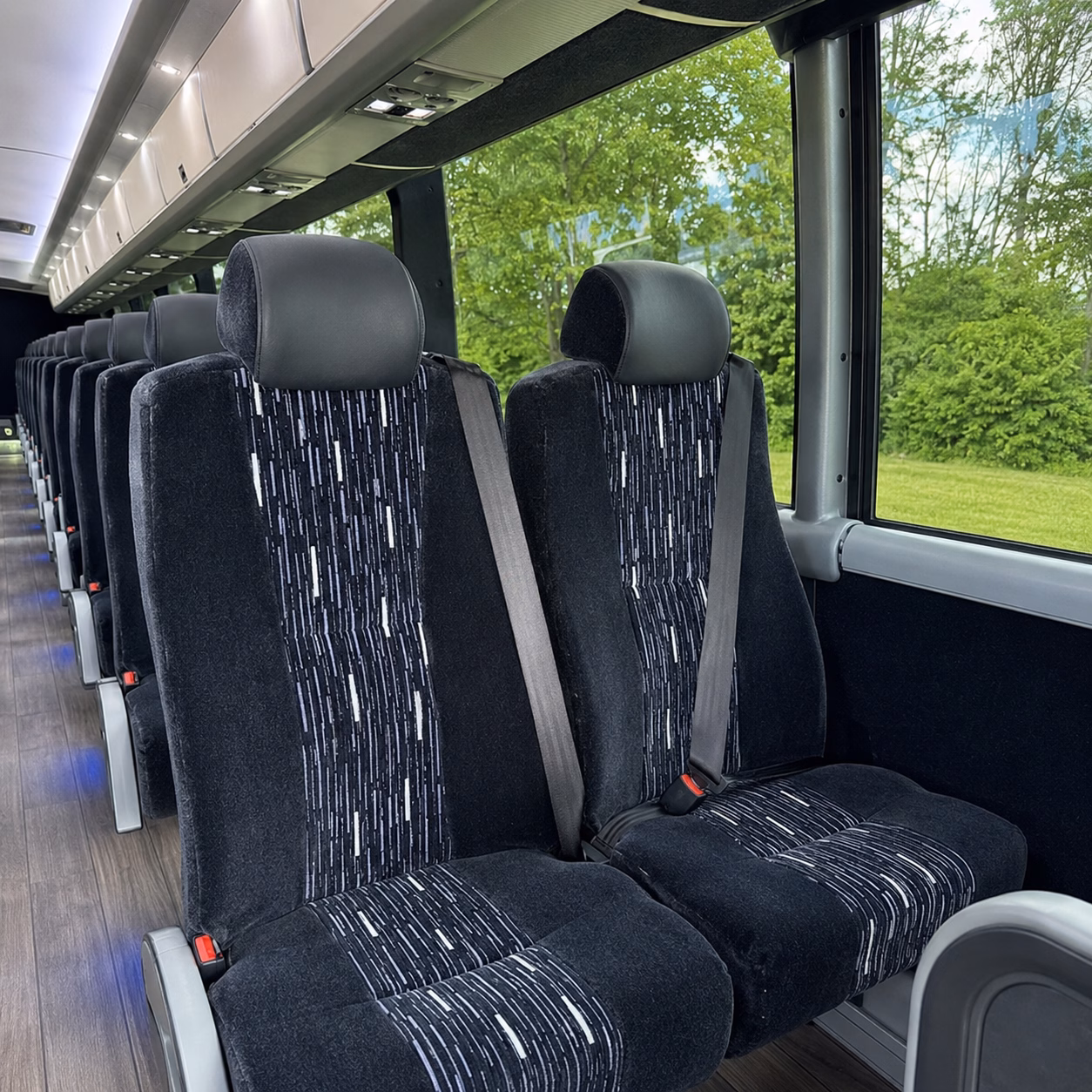 how distance and duration affect charter bus rates in manchester